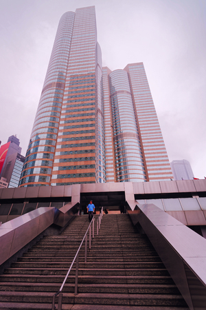 Hong Kong, Hong Kong - March 7, 2016: People on Staircase at Hong Kong Exchange Skyscraper building...