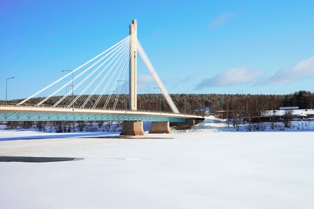 Candle bridge with blue sky in winter Rovaniemi, Lapland, Finlandの写真素材