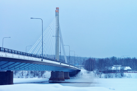 Candle bridge of winter Rovaniemi, Lapland, Finland, illuminated at nightのeditorial素材