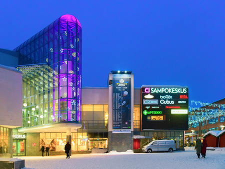 Rovaniemi, Finland - March 1, 2017: Tourists on Lordi Square in winter Rovaniemi, Lapland, in Finland, at night.のeditorial素材