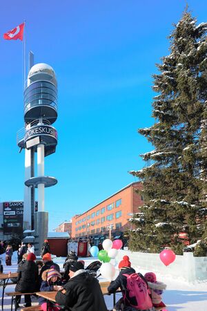 Rovaniemi, Finland - March 4, 2017: People celebrating holiday in Lordi Square in winter Rovaniemi, Lapland, Finland.のeditorial素材