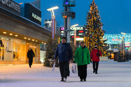 Rovaniemi, Finland - March 1, 2017: People at Lordi Square in winter Rovaniemi, Lapland, Finland, at night.のeditorial素材