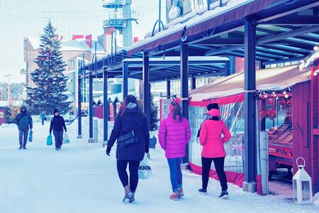 Rovaniemi, Finland - March 4, 2017: People passing by Lordi Square at winter Rovaniemi, Lapland, Finland.のeditorial素材