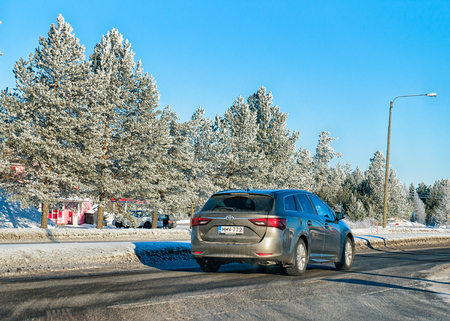 Rovaniemi, Finland - March 7, 2017: Car in the road in winter Rovaniemi, in Lapland, Finlandのeditorial素材