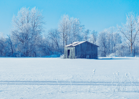 Wooden shed, in winter countryside at Lapland, Finlandのeditorial素材
