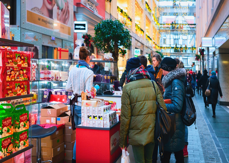 Riga, Latvia - December 29, 2016: People staying in queue for Christmas present at the shopping center in Riga, Latvia.のeditorial素材