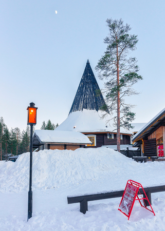 Rovaniemi, Finland - March 6, 2017: Santa Claus Post Office at Santa Village, Lapland, Finland, on Arctic Circle in winter. Sunset. Outdoorのeditorial素材