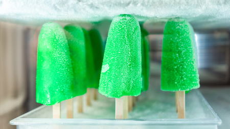 Selection of green frozen fruit sorbet icecream in the fridge on display at the cafe in Positano town, Amalfi coast, Italyの写真素材