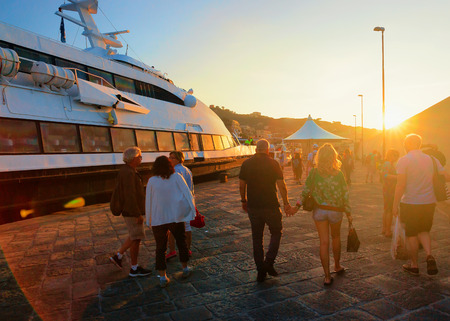 Sorrento, Italy - October 3, 2017: People in Marina Grande port in Sorrento at sunset, Tyrrhenian sea, Amalfi coast, Italyのeditorial素材