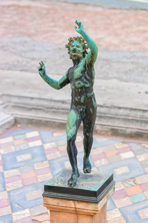 Satyr statue in House of Faun in ancient city Pompeii, Naples, Italyの写真素材