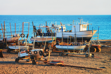 Ships and Mediterranean sea at Santa Teresa di Riva near Messina, Sicily, Italyの写真素材