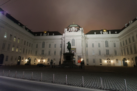 Vienna, Austria - January 8, 2014: Hofburg Palace at Vienna, Austria. At mist and in the eveningのeditorial素材
