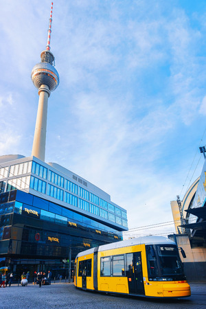 Berlin, Germany - December 10, 2017: Running bus on Alexanderplatz with television tower on the background in Berlin, Germanyのeditorial素材
