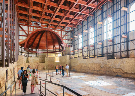 Piazza Armerina, Italy - September 22, 2017: Tourists at basilica with marble panels at Villa Romana del Casale in Piazza Armerina, Sicily, Italyのeditorial素材