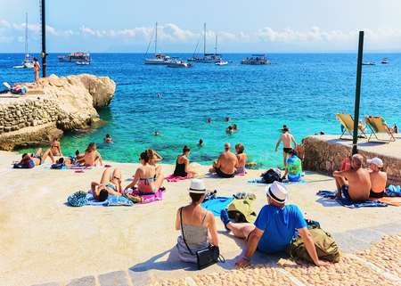 Scopello, Italy - September 17, 2017: People relaxing at the beach in Scopello, Castellammare del Golfo, Sicily, Italyのeditorial素材