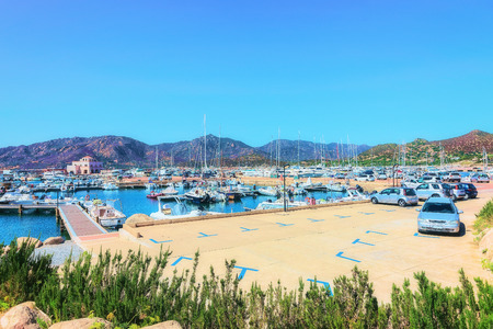 Port with yachts and ships in Villasimius, Cagliari, South Sardinia in Italyの写真素材