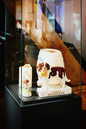 Martigny, Switzerland -  January 1, 2015: Handmade bottle and statues with Saint Bernard dog in breeding kennel and museum in Martigny, Switzerlandのeditorial素材