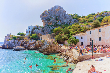 Scopello, Italy - September 17, 2017: People swimming at beach in Scopello, Castellammare del Golfo, Sicily, Italyのeditorial素材