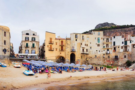 Cefalu, Italy - September 26, 2017: People at the beach in Cefalu old town, Palermo region, Sicily island in Italyのeditorial素材