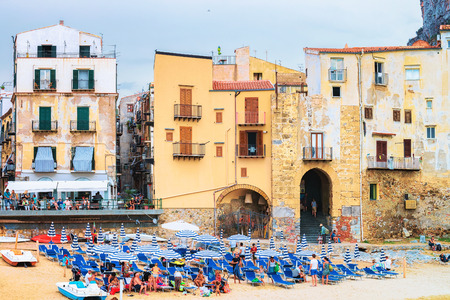 Cefalu, Italy - September 26, 2017: People in the beach in Cefalu old town, Palermo region, Sicily island in Italyのeditorial素材