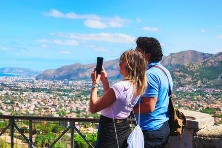 Monreale, Italy - September 18, 2017: People taking photos of cityscape and landscape of Palermo in Sicily, Italyのeditorial素材