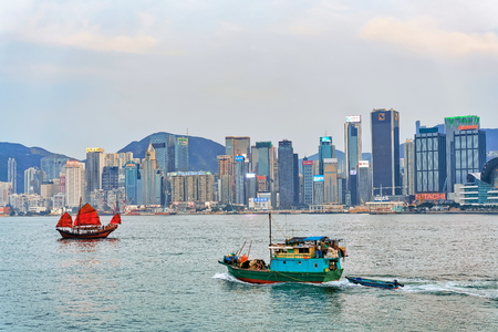 Hong Kong, Hong Kong - March 6, 2016: Vessels at Victoria Harbor of HK at sundown. View from Kowloon on Hong Kong Island.のeditorial素材