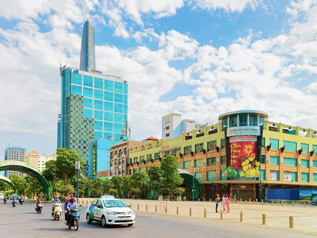 Ho Chi Minh, Vietnam - February 26, 2016: Modern buildings at Business District 1 in street of Ho Chi Minh, Vietnamのeditorial素材