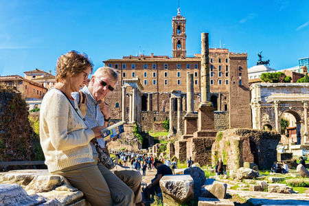 Rome, Italy - October 12, 2016: People reading touristic guide book at Roman Forum in Rome in Italy.のeditorial素材