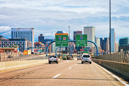 Boston, USA - April 29, 2015: Cars on the road at Boston skyline, MA, USA.のeditorial素材