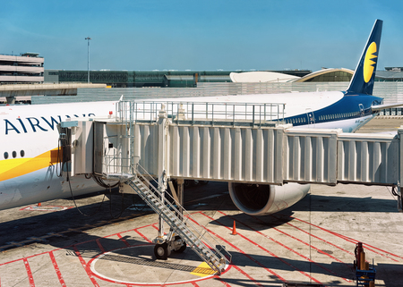 New York, USA - May 7, 2015: Jet bridge at the Airplane in JFK international airportのeditorial素材