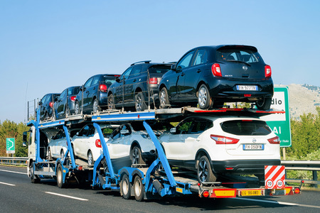 Rome, Italy - October 4, 2017: Cars carrier at road. Truck transporter