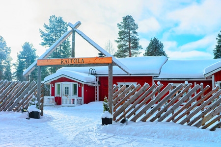 Rovaniemi, Finland - March 3, 2017: Cozy House at Winter Snow Forest at Finnish Saami Farm in Rovaniemi, Finland, Lapland at Christmas. At the North Arctic Pole.のeditorial素材