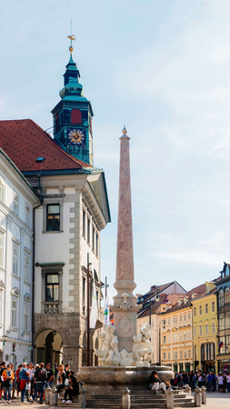 Ljubljana, Slovenia - April 27, 2018: People at Robba fountain at the Old town of Ljubljana in Slovenia. Cathedral on the backgroundのeditorial素材