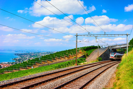 Lavaux, Switzerland - August 30, 2016: Running train in Lavaux Vineyard Terraces hiking trail near Lake Geneva and Swiss Alps, Lavaux-Oron district, Switzerlandのeditorial素材