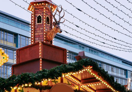 Decoration at Christmas Market at Kaiser Wilhelm Memorial Church in Winter Berlin, Germany. Advent Fair and Stalls with Crafts Items on the Bazaar.の写真素材