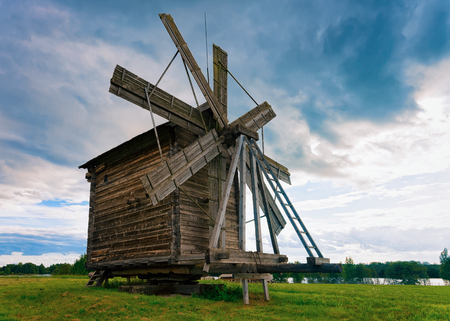 Wooden wind mill at Kizhi Pogost on Ladoga Lake in Karelia in Russiaの写真素材