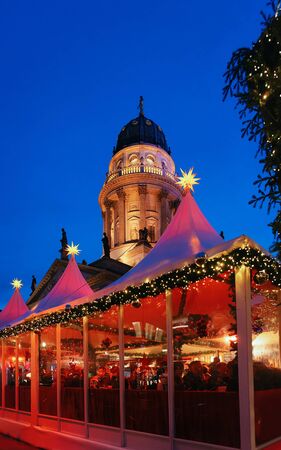 Berlin, Germany - December 13, 2017: Night Christmas Market of Gendarmenmarkt at Winter Berlin, Germany. Advent Fair Decoration and Stalls with Crafts Items on the Bazaar.のeditorial素材