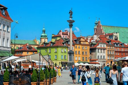 Warsaw, Poland - July 30, 2018: People at Sigismund Column on Castle Square in the Old town of Warsaw in Polandのeditorial素材