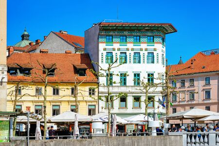 Ljubljana, Slovenia - April 29, 2018: People at sidewalk cafe on Presernov square in the historical center of Ljubljana, in Sloveniaのeditorial素材