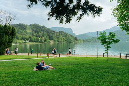 Bled, Slovenia - April 28, 2018: Beautiful scenery with people near the Bled Lake, Sloveniaのeditorial素材