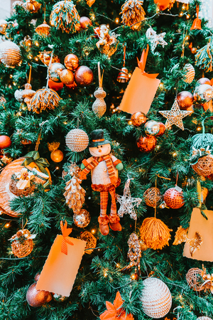 Christmas tree with Xmas balls and toys  decorations in Riga in Latvia in winter.の写真素材