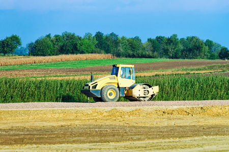 Road roller on the road in Poland.