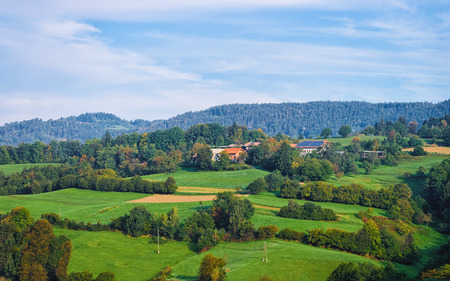 Scenery with houses in the Julian Alps mountains in Slovenia.