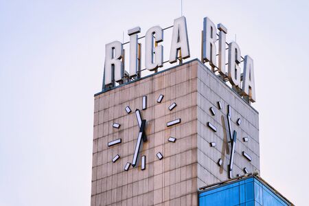 Riga, Latvia - December 27, 2017: Clock of Railway station in Riga in Latvia.のeditorial素材