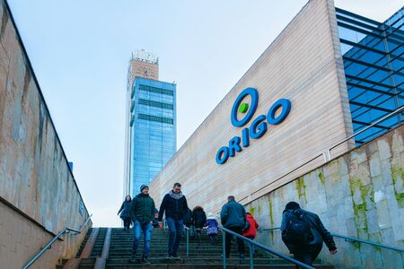 Riga, Latvia - December 27, 2017: Citizens at the staircase of the underground crossing in Riga in...