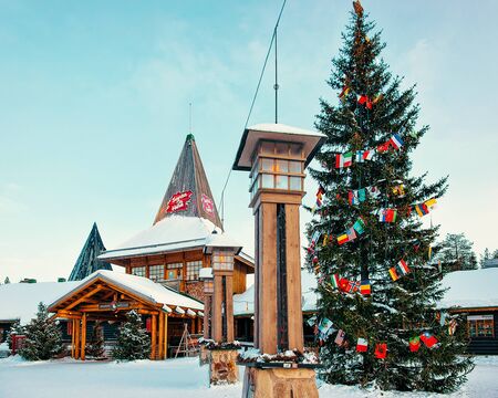 Rovaniemi, Finland - March 5, 2017: Lanterns at Santa Claus Office in Santa Village with Christmas trees, Lapland. Finland, Scandinavia, on Arctic Circle in winter.のeditorial素材