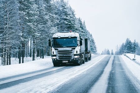 Rovaniemi, Finland - March 3, 2017: Truck on the Snowy winter Road in Finland of Lapland.のeditorial素材