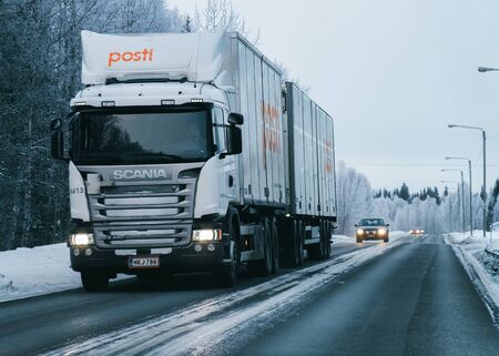 Rovaniemi, Finland - March 7, 2017: Truck at the Snowy winter Road in Finland of Lapland.のeditorial素材