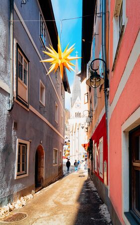 Hallstatt, Austria - January 30, 2019: Houses at Narrow street in Hallstatt near Salzburg in...