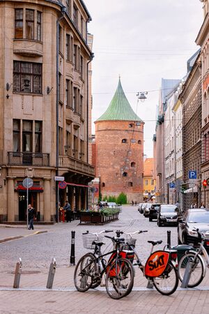 Riga, Latvia - September 1, 2018: Bicycles at Powder Tower in the street of Riga in Latvia.のeditorial素材